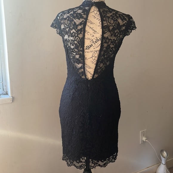 Bebe black sexy lace dress XS only worn it twice - Picture 2 of 3
